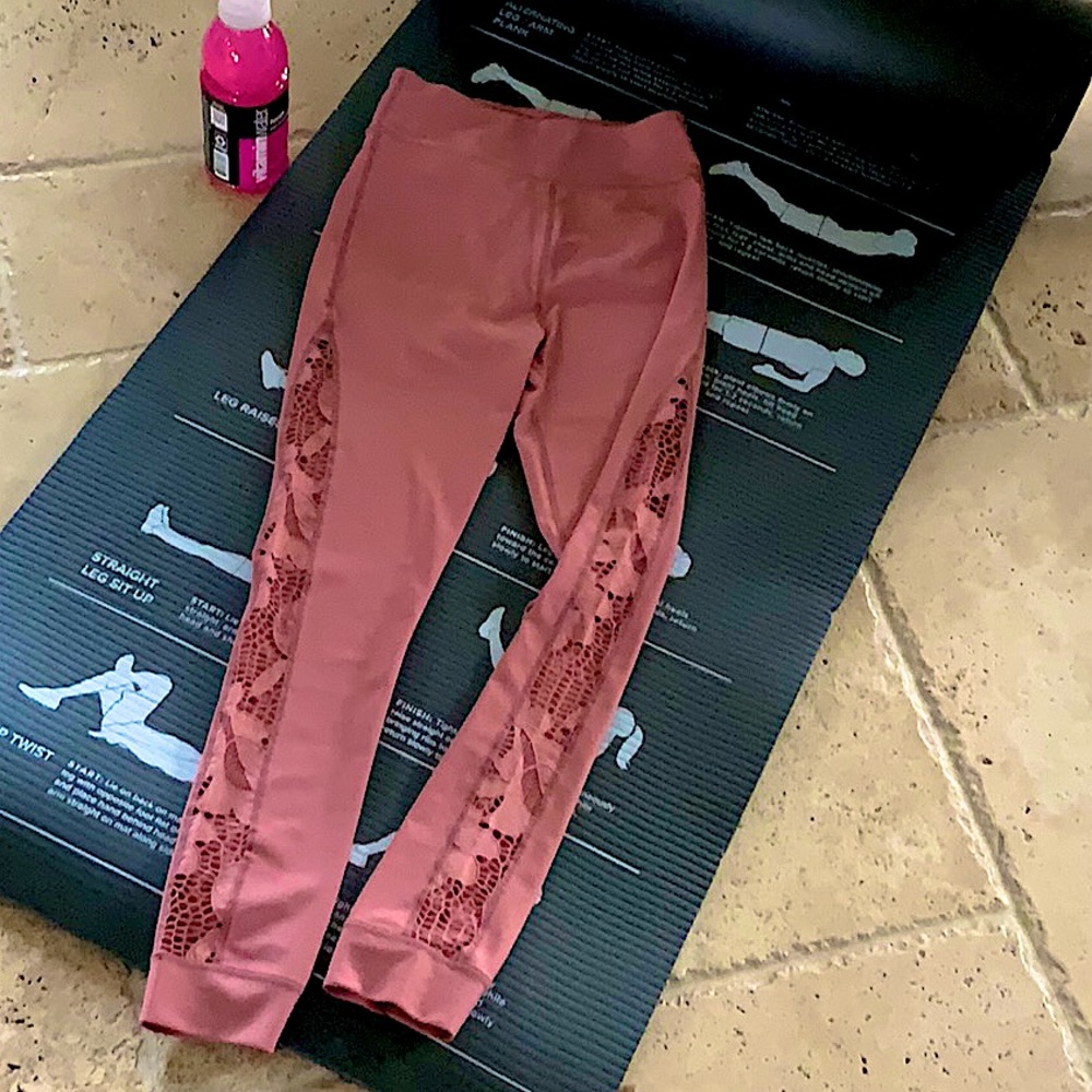 Leggings are a dark mauve color with lace sides.Size 12 junior from Mia Joy. NBW